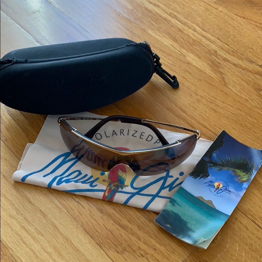 Maui Jim’s , wrap style, brown lens, gold frame